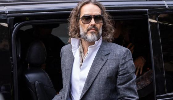 Prosecutor blasts Russell Brand as 'ruthless' sexual predator in rape trial opening