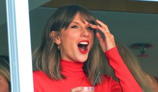 Taylor Swift shows off cute dance moves in bright red look at Travis Kelce’s Chiefs game
