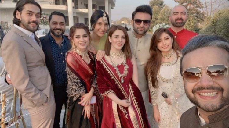 Aima Baig poses stunning looks in red saree on her sister’s wedding 