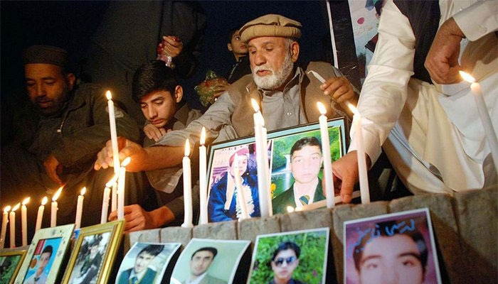 Candlelit vigil held for APS martyrs
