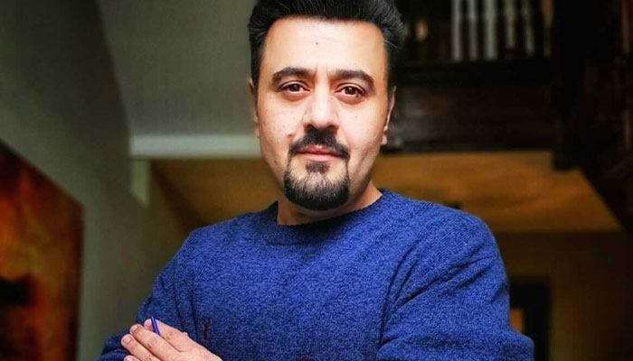 Ahmed Ali Butt gets first dose of COVID-19 vaccine