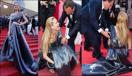 Model Fallen On Red Carpet In Cans Film Festival