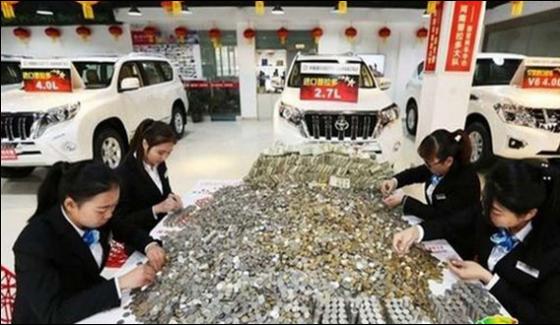 Chinese Men Reached With Full Coins Truck To Buy Car