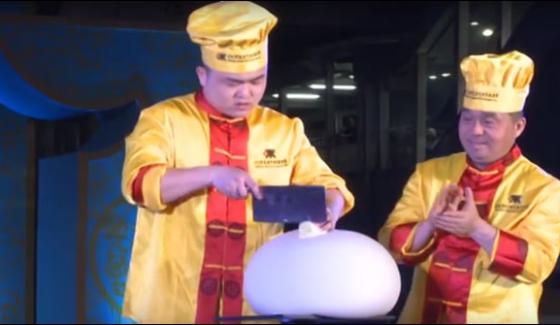 Chinese Chefs Trick Cutting Meat In Balloons Made Of Dough