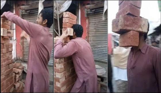 Man From Pakistan Is Wonderful Who Can Lift Bricks With Teeths