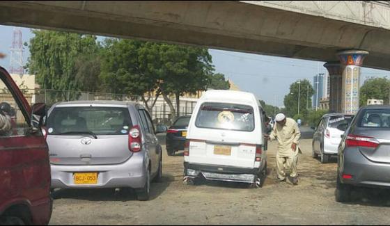Citizens Vehicles Dug In A Pit Road At Shahrae Faisal