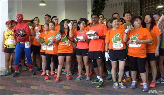 More Than 500 People Take Part In Run With Durians In Singapore