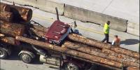Truck Carrying Wood Rolls Over At Least 2 People Injured China