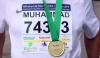 British Pakistani Participates In Paris Marathon With National Flag