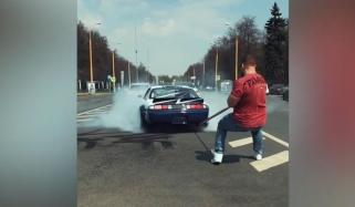 Russian Strongman Pulls Wheelspinning Car