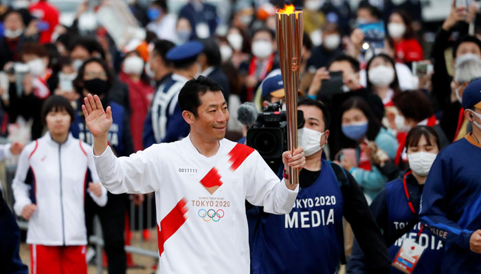 ٹوکیو اولمپکس کی مشعل کا سفر کووڈSOPs کے ساتھ جاری