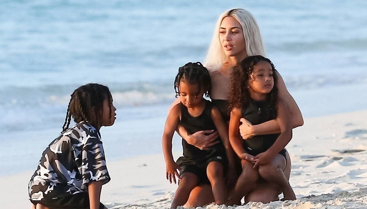 Kim Kardashian soaks up the beach sun with her family: SEE 