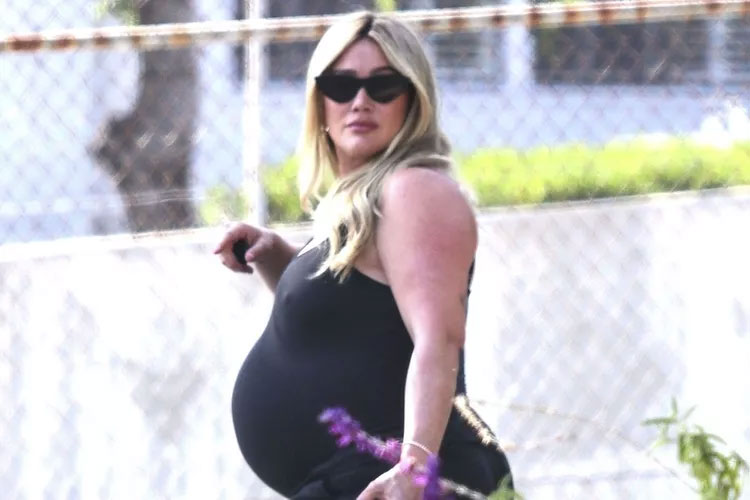 Pregnant Hilary Duff flaunts growing belly as due date draws near