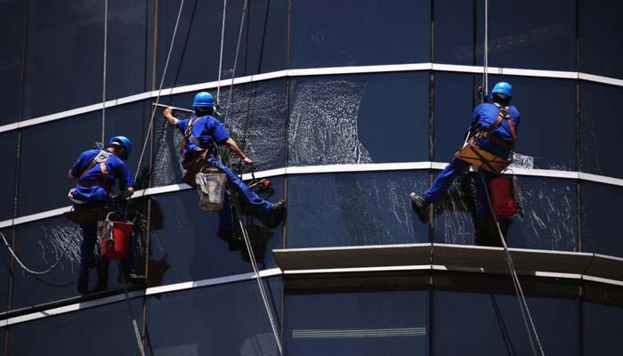 Beijing high winds send window cleaners on horrifying ride: Watch