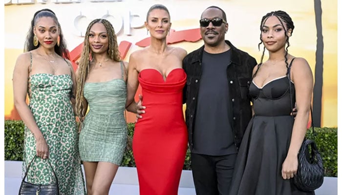 Eddie Murphy accompanies daughters and fiancé Paige Butcher at Beverly Hills Cop sequel’s Premiere