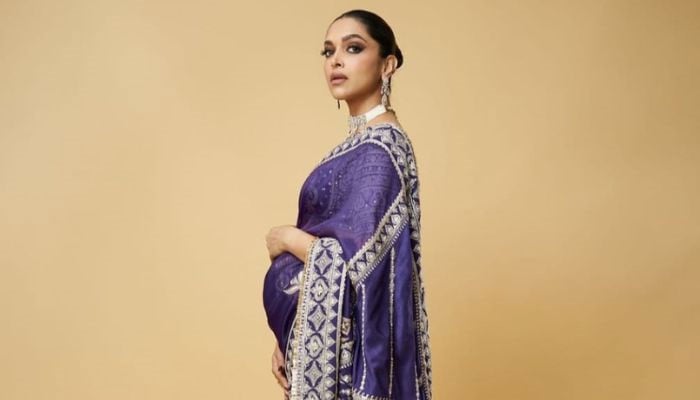 Deepika Padukone has her party mode on in a purple fully embellished saree