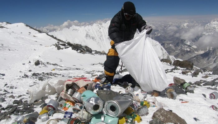 Mount Everest cleanup unearths decades-old waste, clears tons of trash