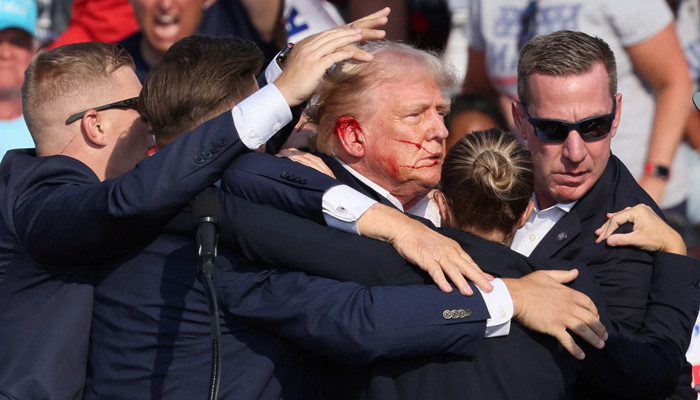 Trump rally shooter killed, while one attendee died and two injured