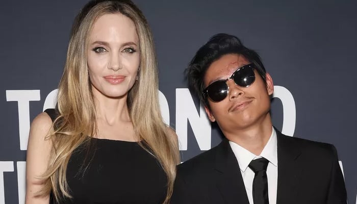 Angelina Jolie’s son Pax stood clapping for her with ‘gruesome’ scars from his bike collision