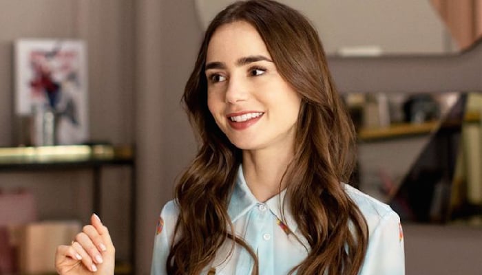 ‘Emily in Paris’ Lily Collins gets into ‘Christmas spirit’ with show’s BTS photos