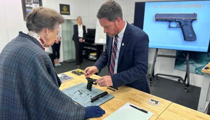 Princess Anne engaged with firearms experts as she took part in live demonstration