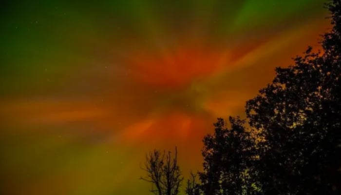 Northern lights illuminate Britain’s skies in stunning purple and green display