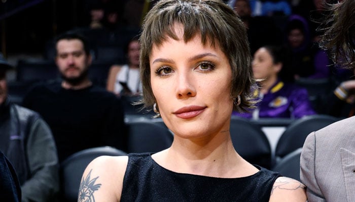 Halsey shares regret over photo she once took with police to avoid trouble