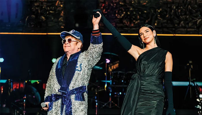 Elton John surprises crowd at Dua Lipas concert to perform duet Cold Heart