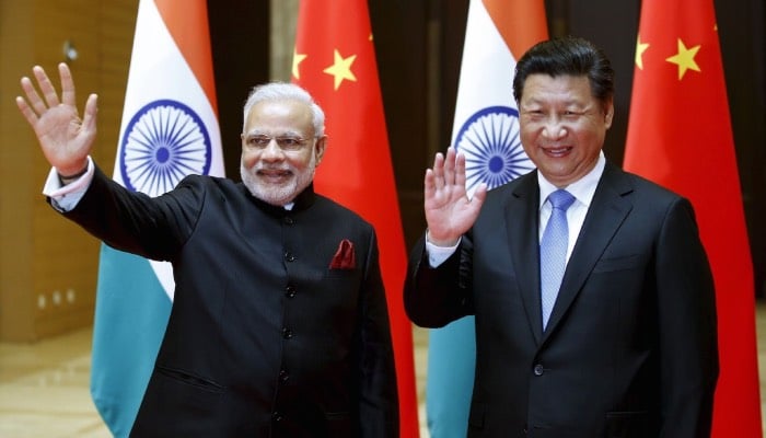 India and China begin troop withdrawal to ease border tensions