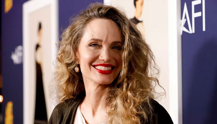 Angelina Jolie stuns in gorgeous curly locks at ‘Maria’ premiere