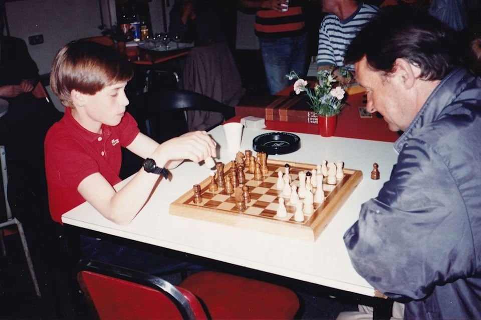 William playing chess at The Passage in June 1993