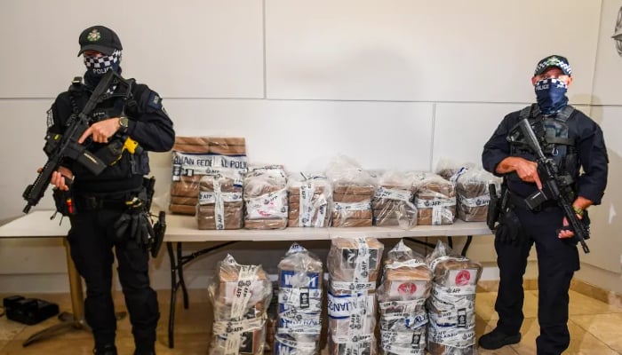 Police have seized a record 2.3 tons of cocaine and arrested 13 people in raids