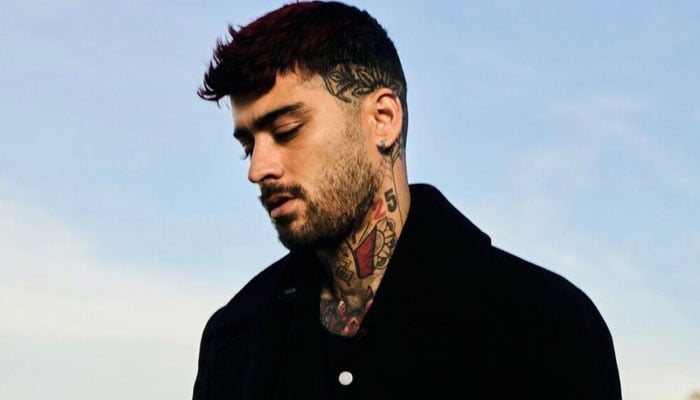 Zayn Malik spotted puffing on cigarette after One Direction comeback announcement