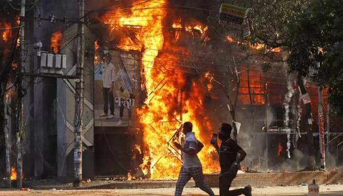 Bangladesh protesters set fire to Hasina’s family house amid growing unrest