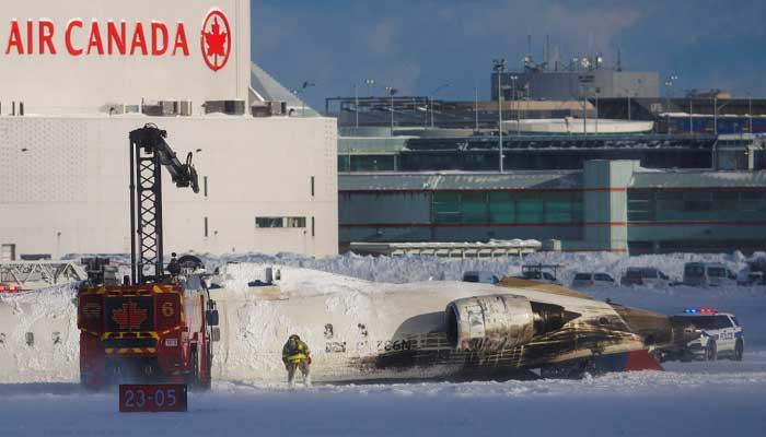 Delta airlines plane flips over at Toronto airport leaving 18 injured