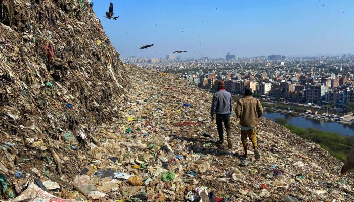 Delhi’s 200-foot garbage mountain becomes death trap for locals