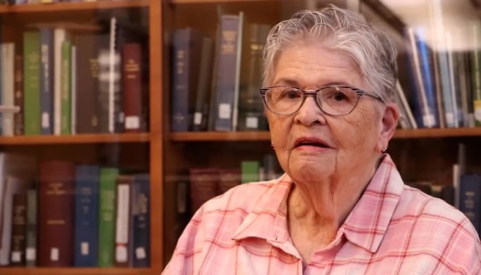 Mary Cooper returns 99-year-overdue library book of grandfather she never met