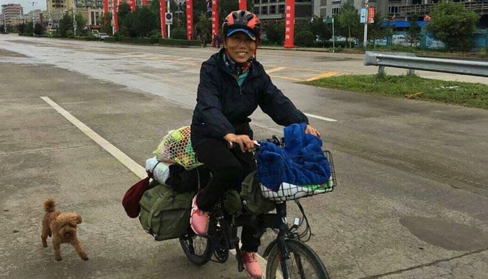 Chinese grandmother pursues international travel by bike