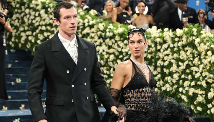 Dua Lipa, Callum Turner make PDA-filled red-carpet debut at Met Gala 2025