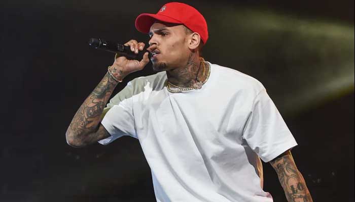 Chris Brown detained in Manchester over bottle attack on music producer
