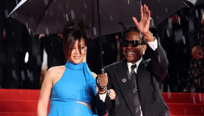 Rihanna turns heads in rain at Cannes, supporting A$AP Rocky’s big premiere