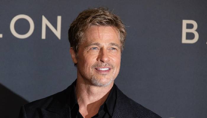 Brad Pitt brings back his signature 90s buzz cut during LA appearance