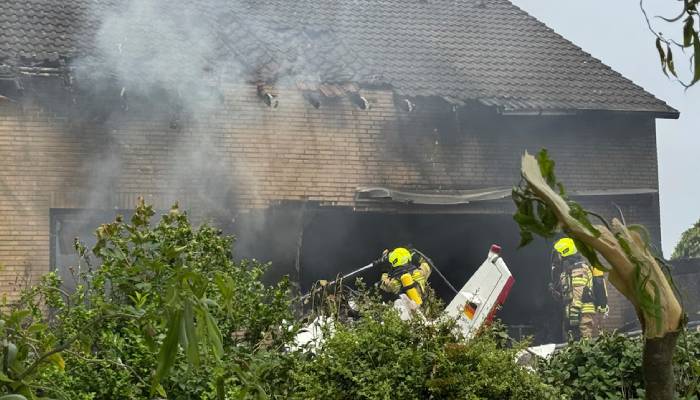 Small aircraft crashes into house in western Germany, two dead