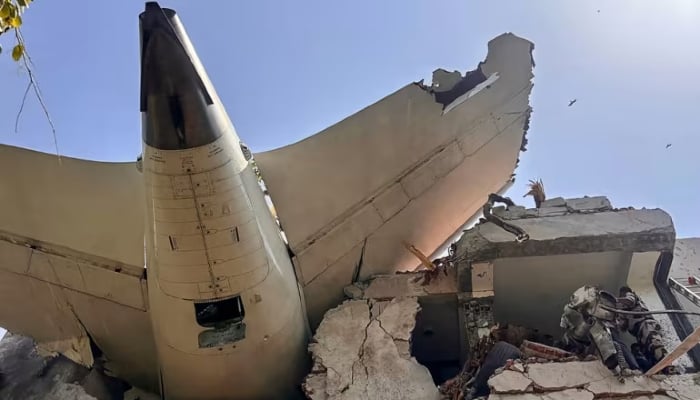 Air India plane carrying 242 people on board crashed into a residential area shortly after takeoff