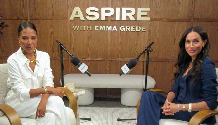 Meghan Markle, Emma Grede get cozy for BTS snaps on podcast set
