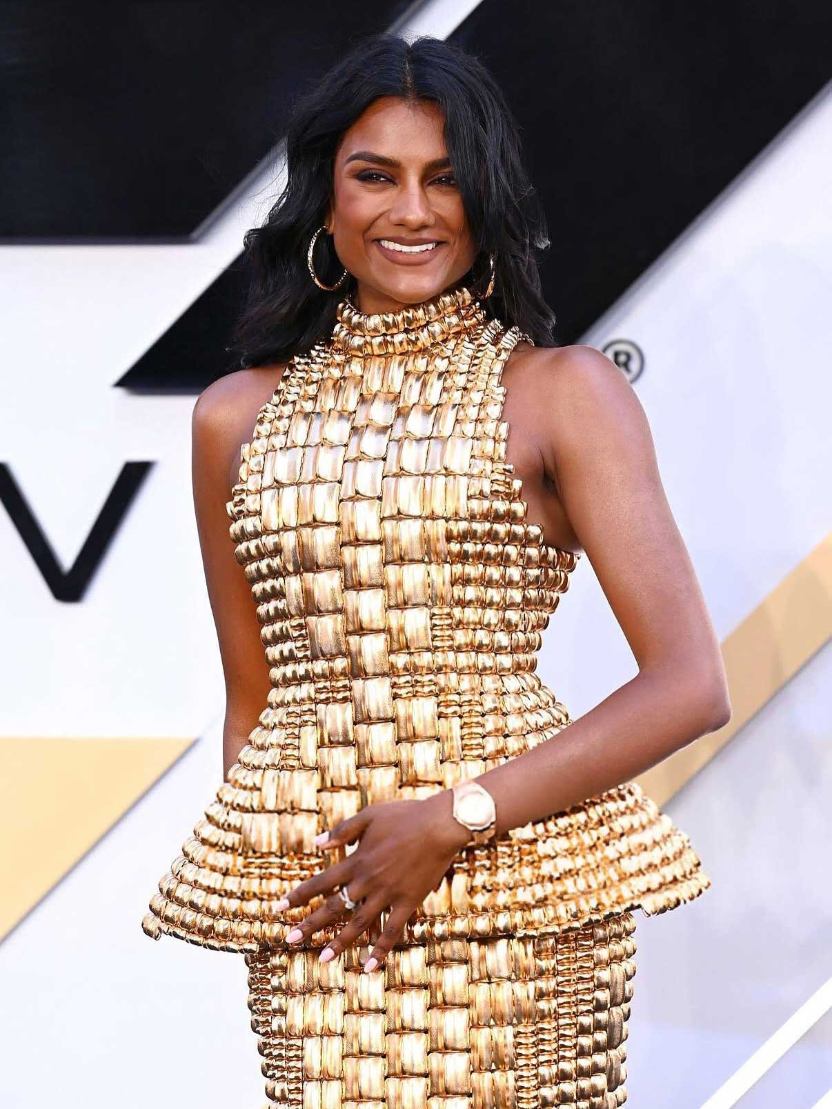 Simone Ashley at F1 London premiere in Balmain dress