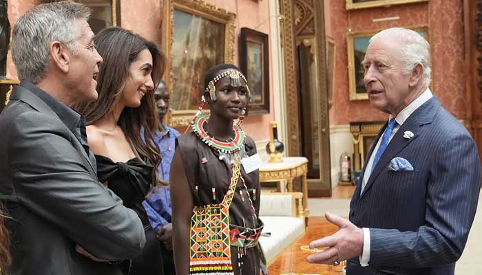 King Charles chit-chats with George, Amal Clooney at Royal Reception