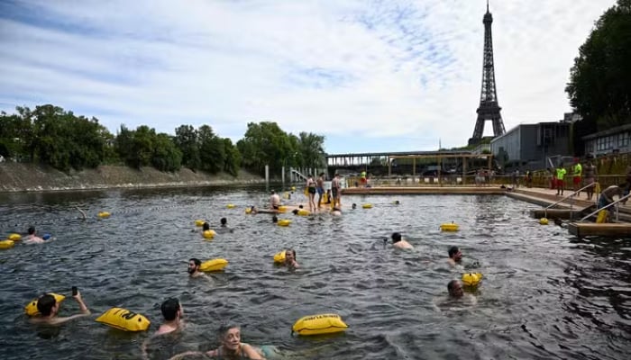 Parisian swimmers celebrate as River Seine reopens after 100-year ban