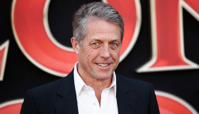 Hugh Grant enjoys nap at Wimbledon, drawing mixed reaction from fans