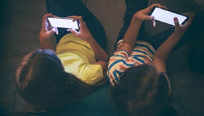 UK plans to introduce two-hour screen time limit, curfews for children